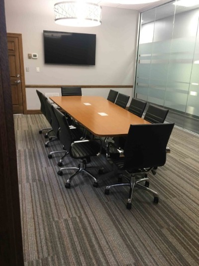 Highway 44 conference room with a long table and chairs
